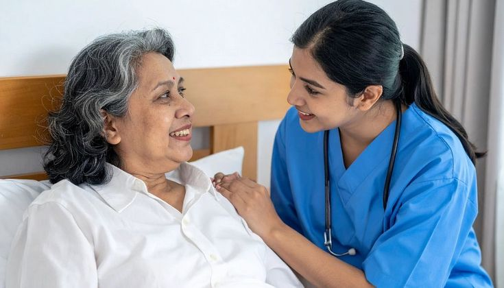 Caregiver helping elderly person
